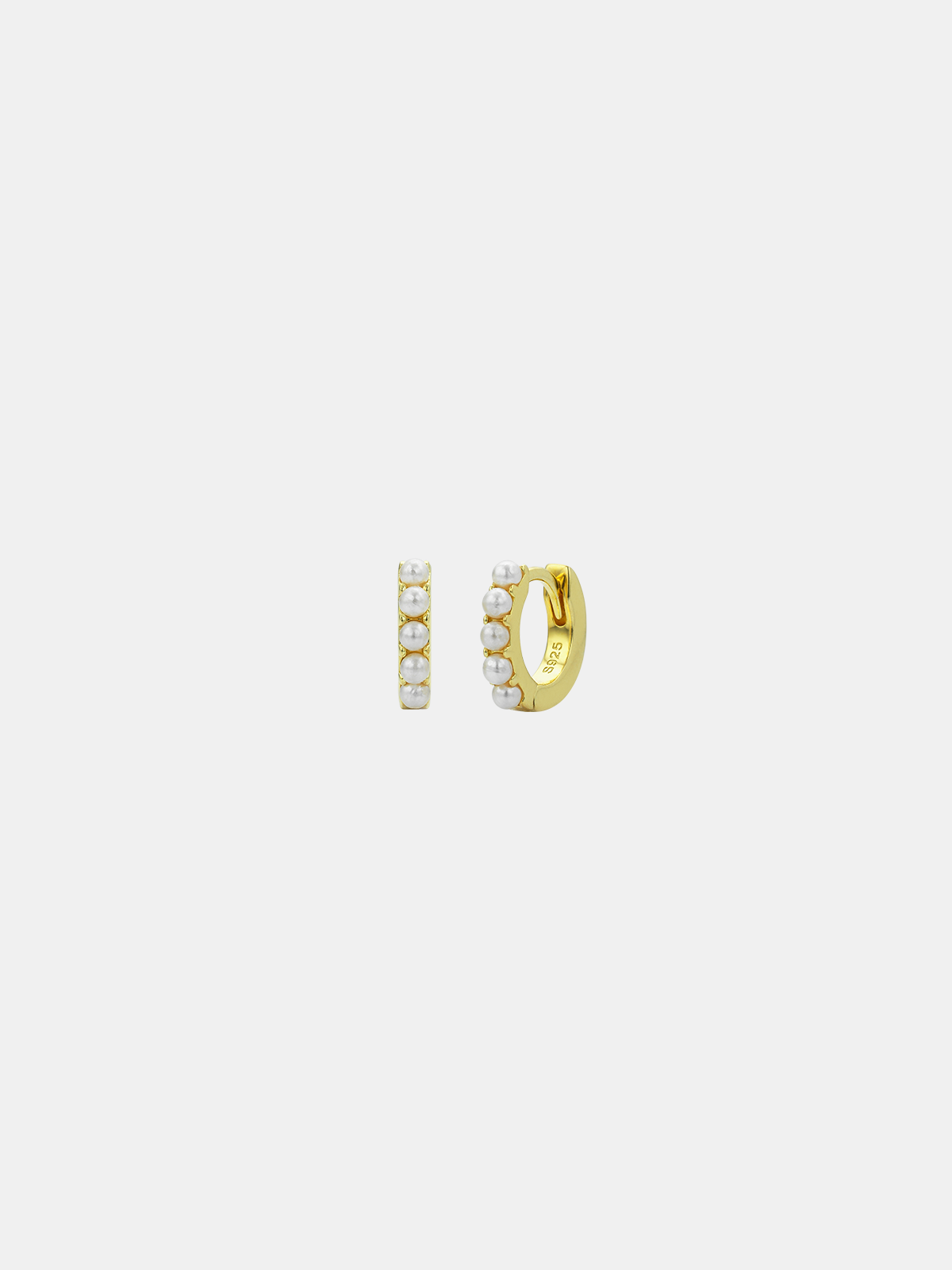 Gold hoop earrings with mini pearls on a white background