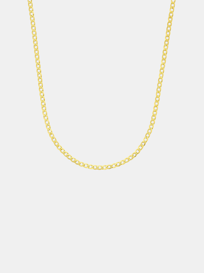 Gold chain necklace on a light gray background