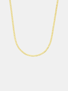 Gold chain necklace on a light gray background