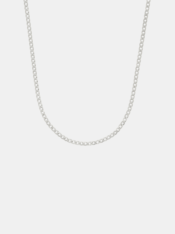 Silver chain necklace on a light gray background