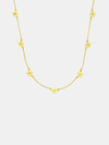 Gold necklace with floral pendants on a white background