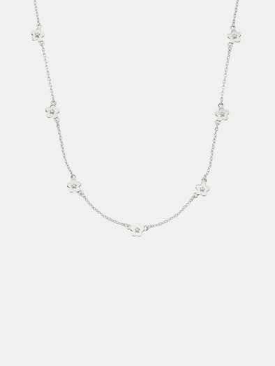 Silver necklace with small floral pendants on a white background