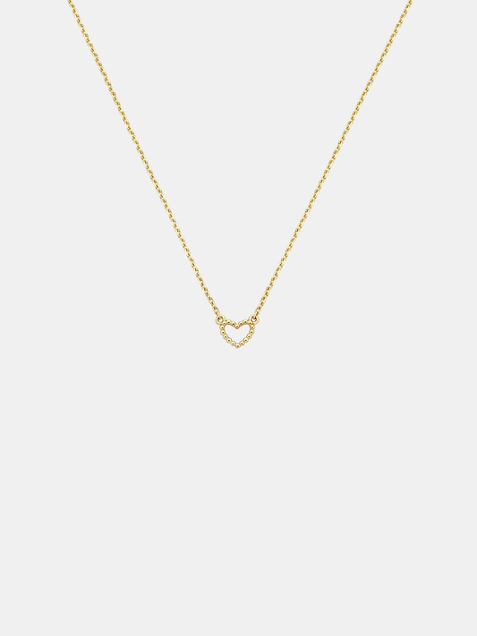 Solid gold dotty love heart-shaped pendant necklace on a light gray background
