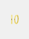 Gold hoop earrings on a light gray background