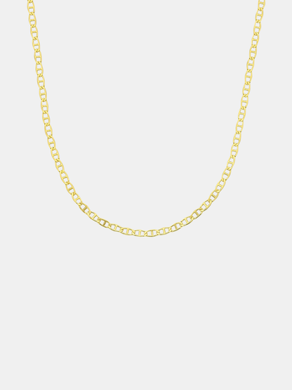 Gold chain necklace on a light gray background