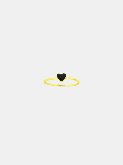 Ring with a black heart-shaped center on a white background