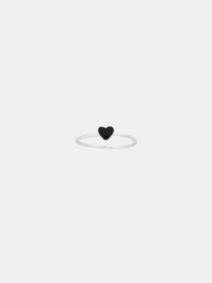 Black heart-shaped ring on a white background