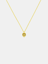 Gold necklace with a lily pendant featuring small pearl on a white background