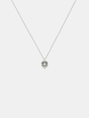 Silver necklace with a lily  pendant with small pearl on a light gray background