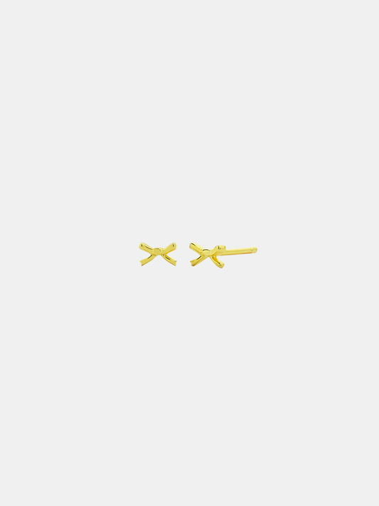Pair of gold bow-shaped earrings on a white background