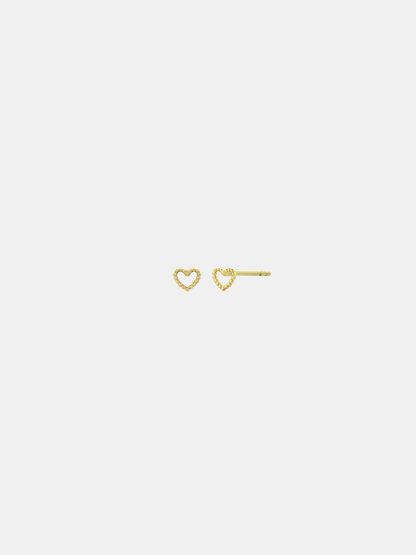Two solid gold heart-shaped stud earrings on a white background
