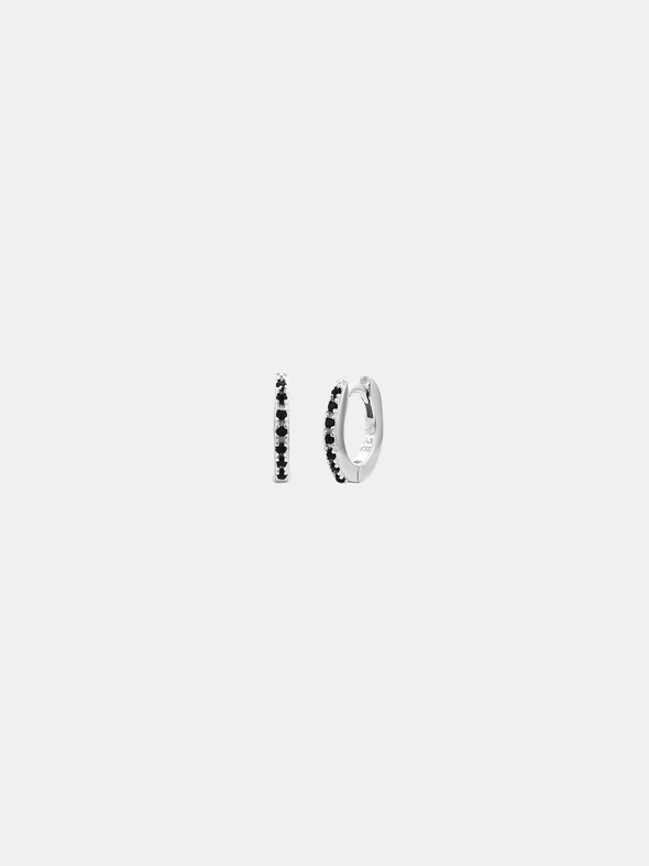 Two pairs of hoop earrings on a white background