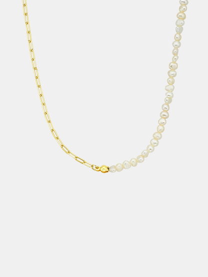 Pearl necklace with gold chain on a white background