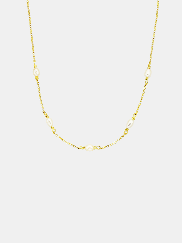 Gold chain pearl necklace on a white background