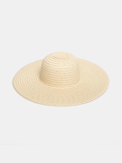 Beige straw hat on a white background
