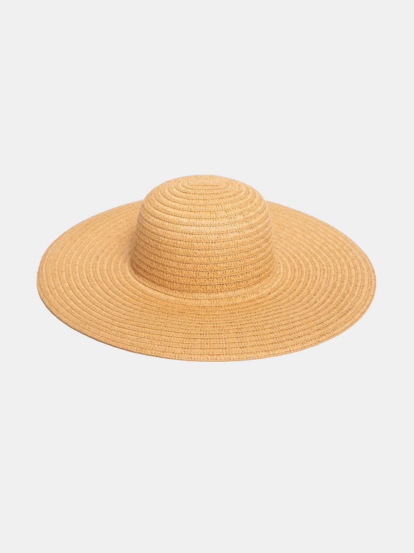 Beige straw hat on a light beige background