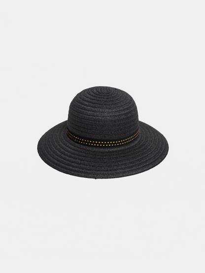 Black straw hat with a yellow band on a light gray background