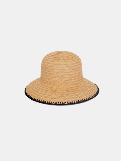 Beige straw hat with black trim on a white background