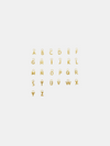 Solid gold little letter pendants on a white background