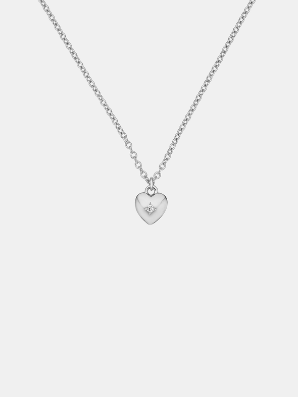 Silver heart-shaped pendant necklace on a light gray background
