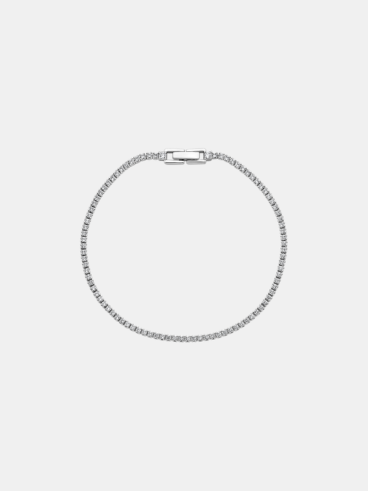 Silver bracelet on a light gray background